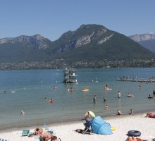 Relaxing and paddling on the beach at Saint-Jorioz, Lake Annecy